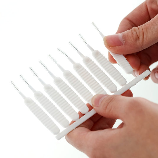 set of 10 pieces, small and soft brushes. To clean the charging slot, headphones, and keyboard