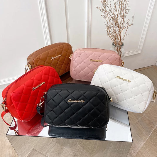 Stylish women's bag of soft leather, a brand and bright colors