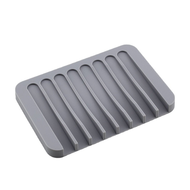 Load image into Gallery viewer, A silicone shelf is placed around the faucet. It holds the sponge. There is a passage for draining the water
