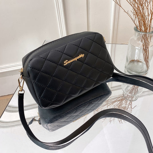 Stylish women's bag of soft leather, a brand and bright colors
