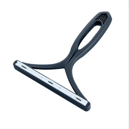 Pet, cat and dog hair remover removes lint from clothes and upholstery